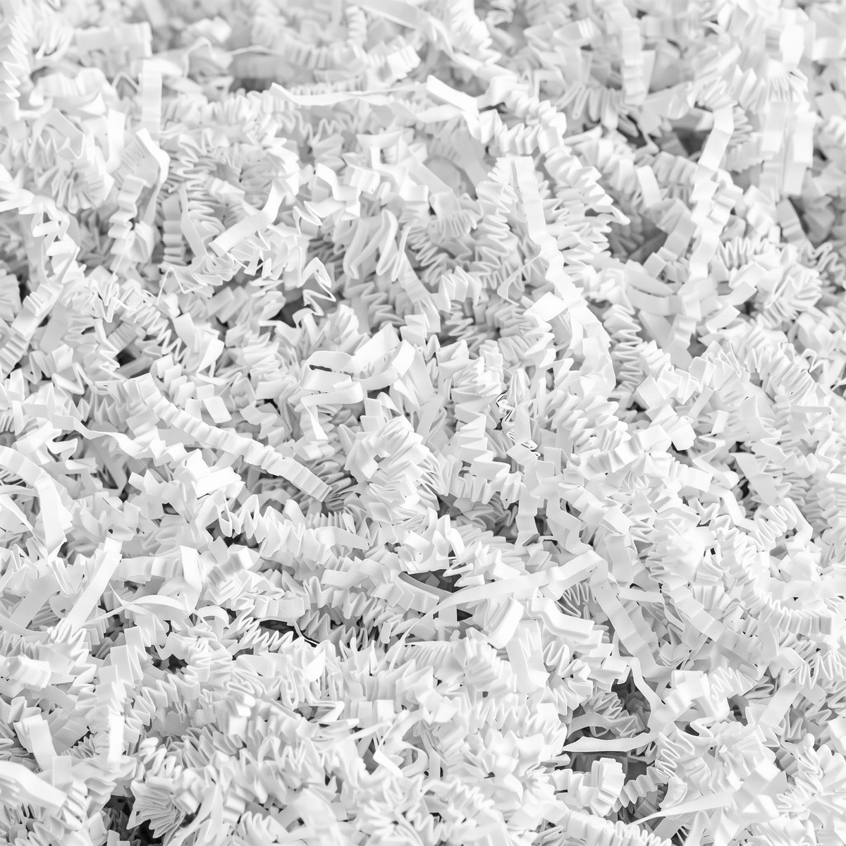 White crinkle cut shredded paper filler